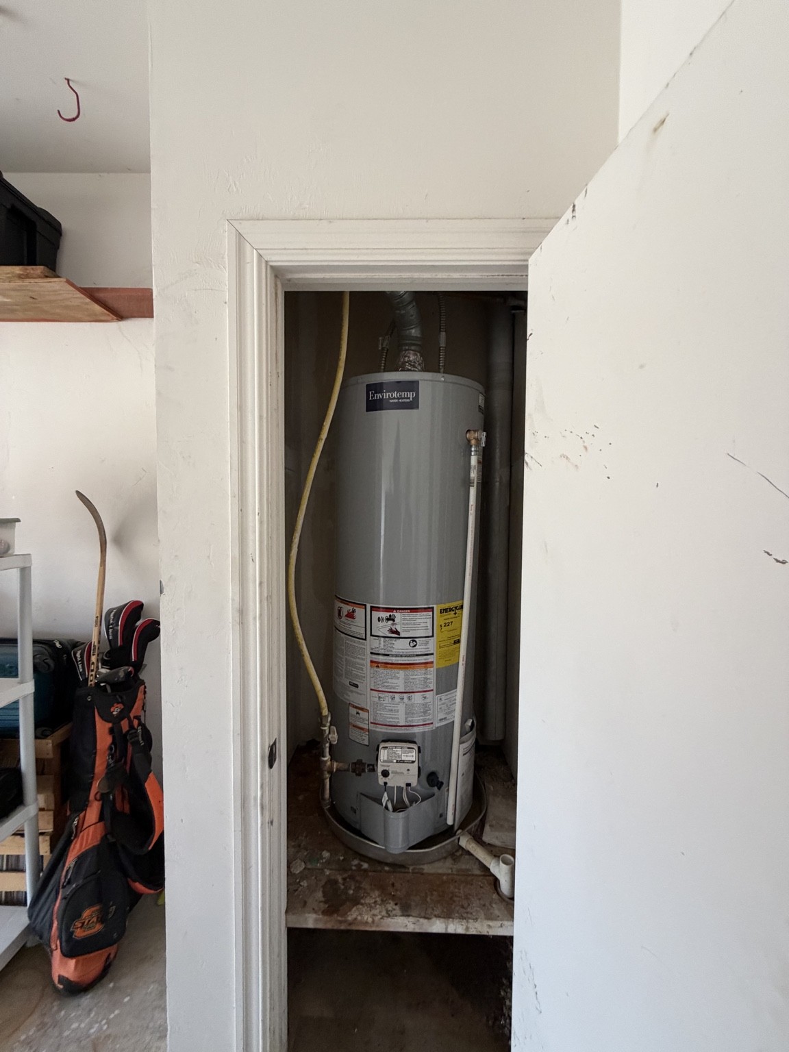 Existing residential water heater before replacement by Total Home Care